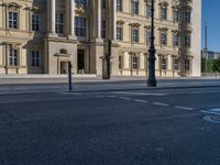 two lanes that appear to be in the middle of the road, and are straight lines to the left