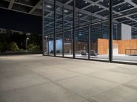 the glass doors on this building provide privacy and sunlight to the space below, while sitting in a chair