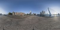 a view of a city from outside of a fish eye lens on a clear day