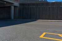 an image of a parking lot near buildings in the city of los angeles, california