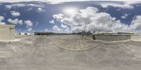 an image of the outside city taken on a 360 - view camera camera at daytime