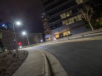 a car stop at night on the street by some buildings in downtown atlanta, ga