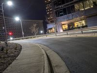 a car stop at night on the street by some buildings in downtown atlanta, ga