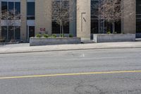 the yellow line shows where the stop signs are on the street and the building is empty