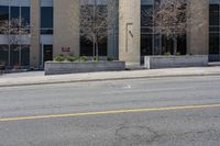 the yellow line shows where the stop signs are on the street and the building is empty