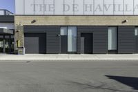 the front facade of a store with windows and street signs painted on it that reads help the gotham area