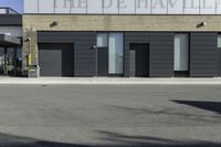 the front facade of a store with windows and street signs painted on it that reads help the gotham area