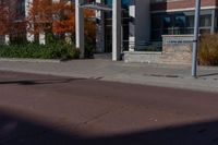 an empty street with a sign that says to not ride on it and a no parking sign