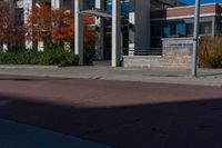 an empty street with a sign that says to not ride on it and a no parking sign