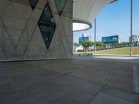 this is a long brick pathway with many walkways in front of it and benches on either side