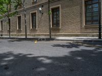 the side walk and walkway of a building is marked with markings for parking spaces below