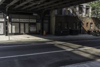 Urban Design: A Window View of a Building and Asphalt Road