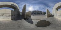 a large concrete structure with the word space above it and two concrete blocks on each side of it