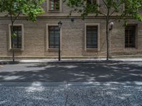 the side walk and walkway of a building is marked with markings for parking spaces below