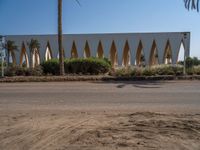 Urban Egypt: Clear Sky, Palm Trees, and Architecture