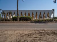 Urban Egypt: Clear Sky, Palm Trees, and Architecture