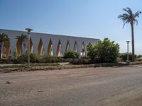 Urban Egypt: Clear Sky, Palm Trees, and Architecture