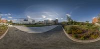 360 - angle photo of the university campus courtyard as seen from a skateboarder's driveway