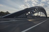 car going through the bridge with no traffic on it's track, in motion