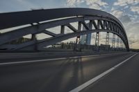 car going through the bridge with no traffic on it's track, in motion