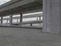 the street is lined with columns and concrete pillars that line all sides of the road