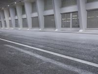 Urban Infrastructure in Valencia: A Road Surrounded by Modern Buildings