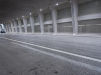 Urban Infrastructure in Valencia: A Road Surrounded by Modern Buildings