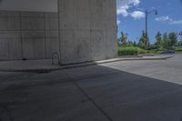 a boy on a skateboard is doing tricks near a building and trees of many colors