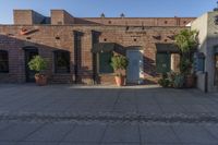 Urban Landscape: Brick Wall Under a Clear Sky