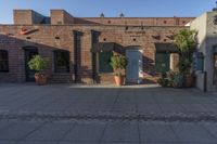 Urban Landscape: Brick Wall Under a Clear Sky