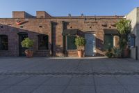 Urban Landscape: Brick Wall Under a Clear Sky