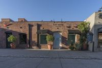 Urban Landscape: Brick Wall Under a Clear Sky