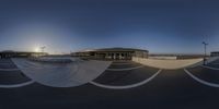 there is an upside down photograph taken from a skateboard ramp with no rider on it