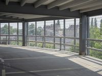 empty large open parking space with an area that looks out onto the countryside and outside