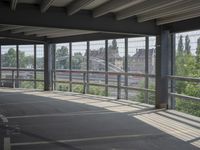 empty large open parking space with an area that looks out onto the countryside and outside