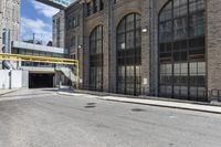 the entrance to an empty city street in downtown detroit, michigan, usa on a sunny day