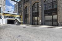 the entrance to an empty city street in downtown detroit, michigan, usa on a sunny day