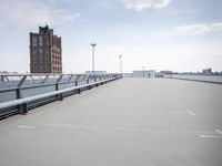 a boat is parked in an empty parking lot near an air port on the water