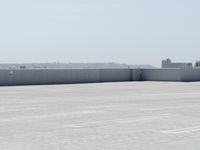 the top of a parking lot with no one going on it with no cars outside