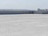 the top of a parking lot with no one going on it with no cars outside