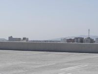 the top of a parking lot with no one going on it with no cars outside