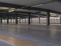 a hallway with parking and shelves at an airport setting with no people around it,