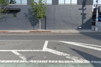 Urban Road: Asphalt and Low Building in New York City