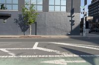 Urban Road: Asphalt and Low Building in New York City