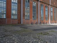 Urban Road in Berlin with Brick Walls