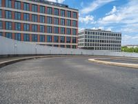 a car is driving on the highway through an underground parking garage area in a city