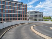 a car is driving on the highway through an underground parking garage area in a city