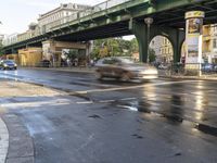 the view under the highway, on a rainy day of the city street and on the streets with buildings and bicycles