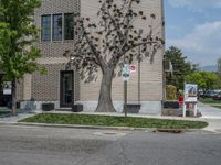 a store on the corner in a small town that has lots of gray brick walls