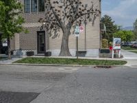 a store on the corner in a small town that has lots of gray brick walls